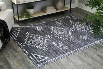 Arloman - 5' x 7' Rug - Black / Cream / Gray
