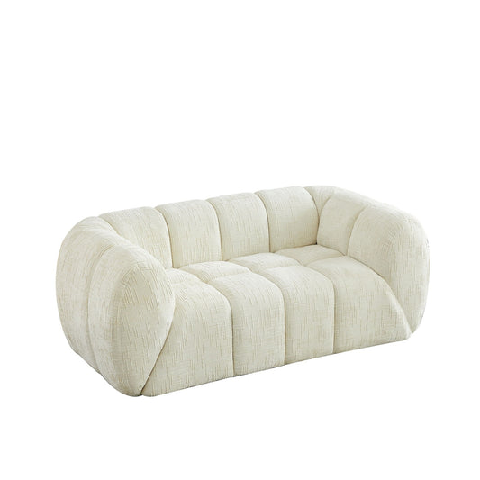 Quilted Cloud Sofa With Rounded Armrests And Piano Key Backrest Design